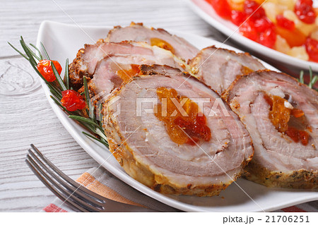 pork roll with apricot and cherry closeup pork roll with apricot and cherry closeup 21706251