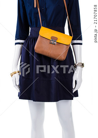 Leather handbag with navy shirt. Leather handbag with navy shirt. 21707858