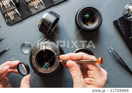 Photo camera lens repair set. Engineer maintenance 21708868