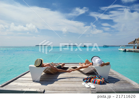 happy young couple have fun on beach happy young couple have fun on beach 21711620