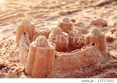 Sand castle tower. Child play and vacation concept 21717031