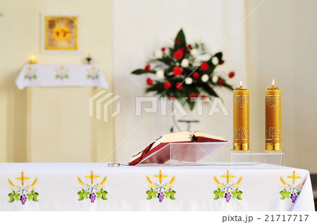 Two burning candles in the temple for worship 21717717