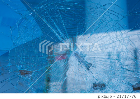 background broken glass from the bullets on facade 21717776