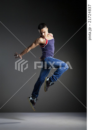 Dancer posing in front of the studio background 21724837