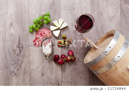 Still life with red wine and excellent food. 21724844