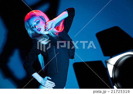 Fashion colorful shot of woman in leather jacket Fashion colorful shot of woman in leather jacket 21725319