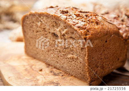 Bread assortment on wooden surface Bread assortment on wooden surface 21725556