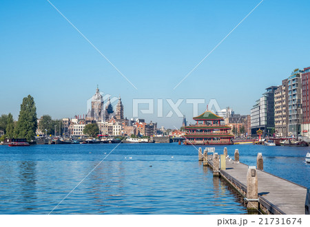 Saint Nicholas church in Amsterdam with sea gull Saint Nicholas church in Amsterdam with sea gull 21731674