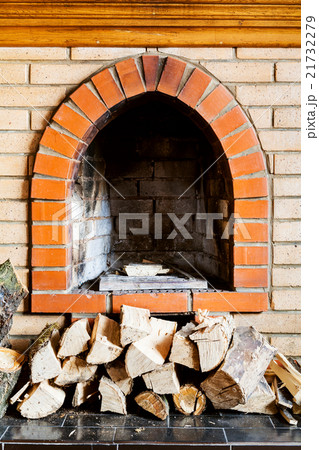 not kindled brick fireplace and wood logs not kindled brick fireplace and wood logs 21732279