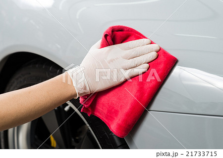 Car detailing series : Worker cleaning gray car Car detailing series : Worker cleaning gray car 21733715