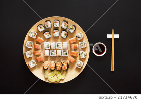 Set of sushi maki and rolls at black background 21734670