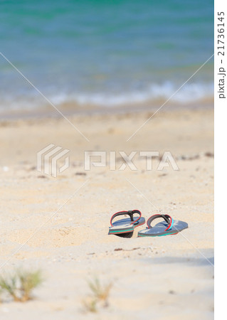 Lady sandal on the beach Lady sandal on the beach 21736145