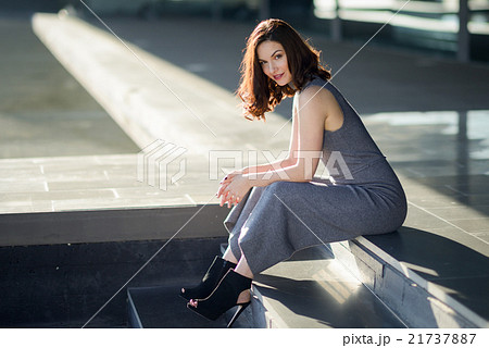 Young woman wearing casual clothes in urban background 21737887