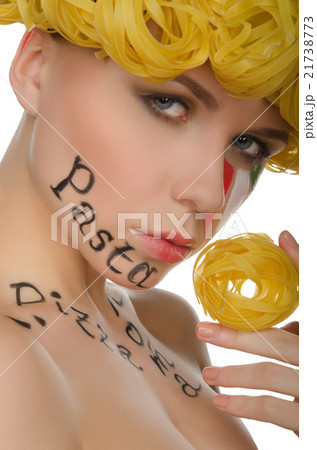 Beautiful woman with pasta and symbols of Italy Beautiful woman with pasta and symbols of Italy 21738773