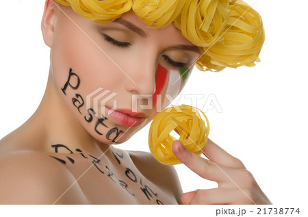 woman with hair pasta and symbols of Italy 21738774