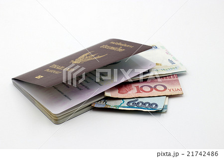 Thailand passport book and bank note on white 21742486