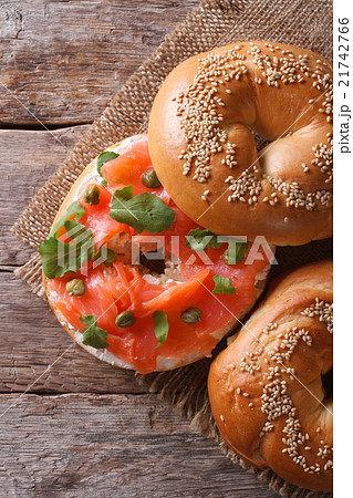 bagel with salmon and cream cheese top view 21742766