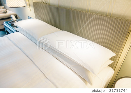 White pillow on bed White pillow on bed 21751744