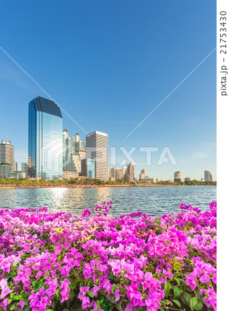 Tall building behind Benjakiti Park in Bangkok, Thailand 21753430