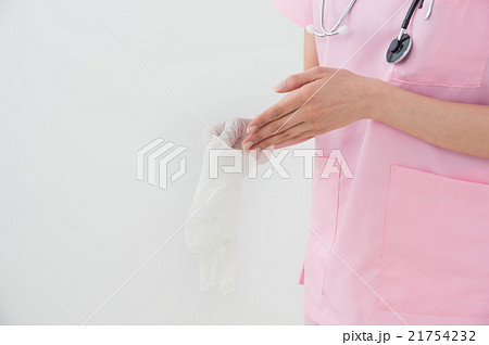 ゴム手袋をつける医療従事者(ボディパーツ) ゴム手袋をつける医療従事者(ボディパーツ) 21754232