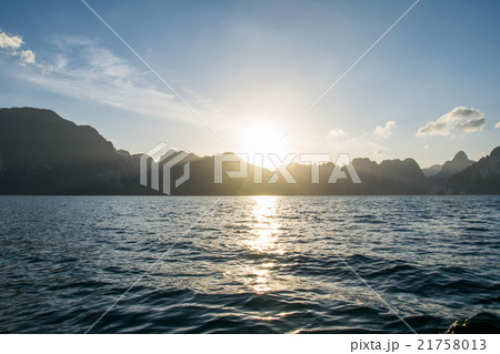 Sun rise behind mountain at Khao Sok National Park 21758013