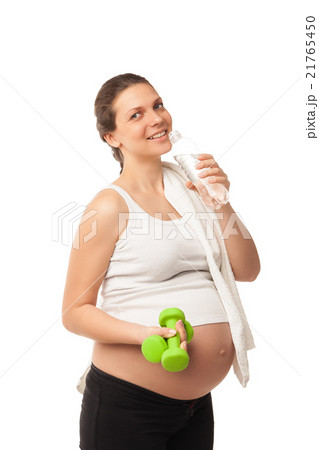 Pregnant girl lifting dumbbells isolated on white 21765450