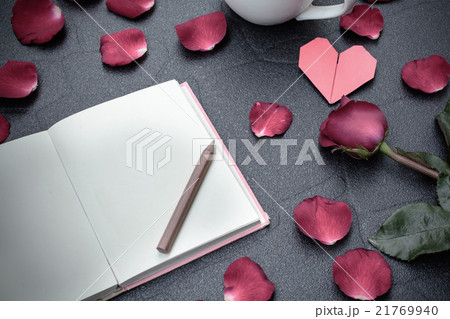 Red rose with heart shape 21769940