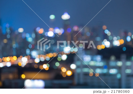 Abstract blurred lights, city office building nigh 21780360
