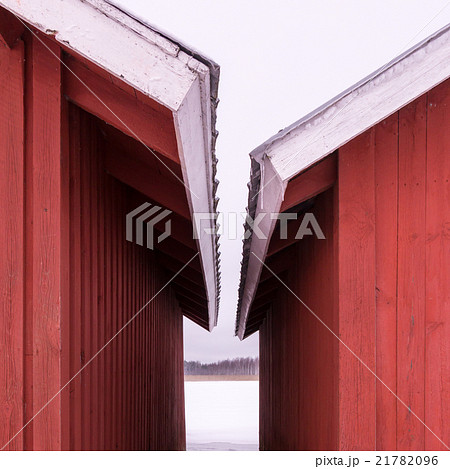 Close eaves of red wooden buildings Close eaves of red wooden buildings 21782096