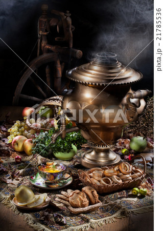 Still Life With Samovar, Fruits, Tea And Spinning Wheel 21785536