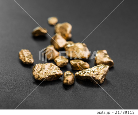 handful of gold nuggets close-up handful of gold nuggets close-up 21789115