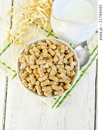 Bran in bowl on light board top 21789495