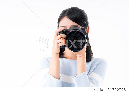 カメラを構える女性の写真素材