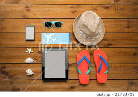 close up of tablet pc and travel stuff 21793705