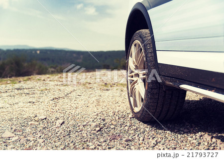 close up of dirty car wheel on cliff close up of dirty car wheel on cliff 21793727