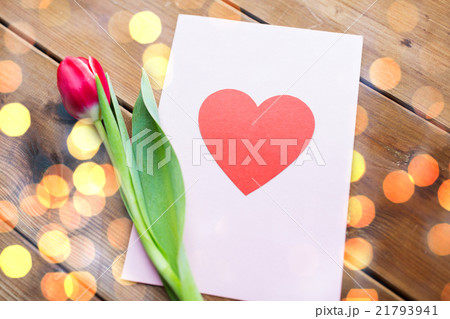 close up of flowers and greeting card with heart close up of flowers and greeting card with heart 21793941