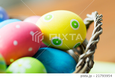 close up of colored easter eggs in basket close up of colored easter eggs in basket 21793954