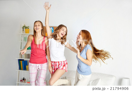 happy friends or teen girls having fun at home 21794906