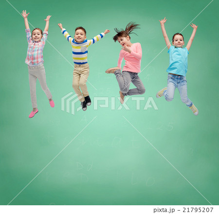 happy little girl jumping in air over school board 21795207