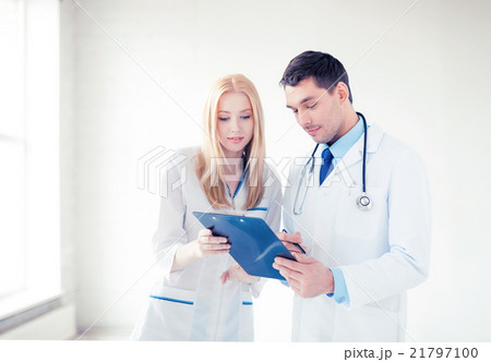 two young attractive doctors two young attractive doctors 21797100