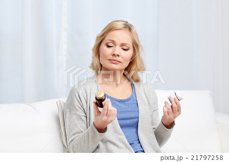 woman with medicine jars at home woman with medicine jars at home 21797258