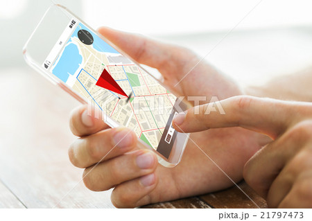 close up of hand with navigator map on smartphone 21797473