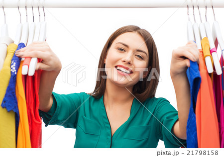 happy woman choosing clothes at home wardrobe happy woman choosing clothes at home wardrobe 21798158