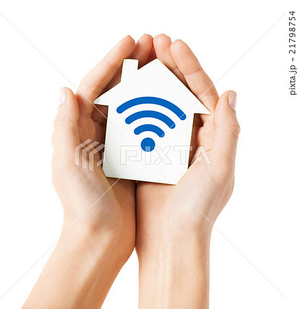 hands holding house with radio wave signal icon 21798754