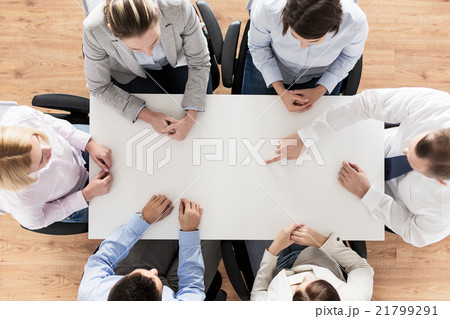 close up of business team sitting at table close up of business team sitting at table 21799291