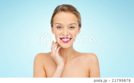 smiling young woman with pink lipstick on lips smiling young woman with pink lipstick on lips 21799878