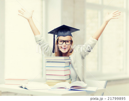 happy student in graduation cap 21799895