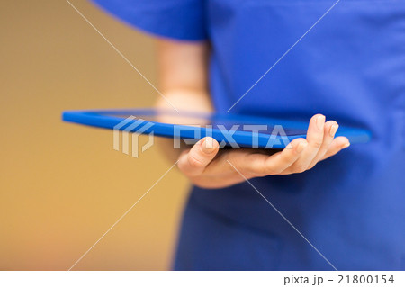 close up of female doctor or nurse with tablet pc close up of female doctor or nurse with tablet pc 21800154