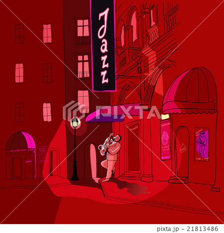 saxophone player in a street at night 21813486