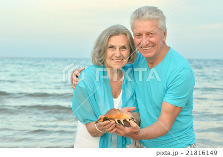 elderly couple rest at tropical resort elderly couple rest at tropical resort 21816149